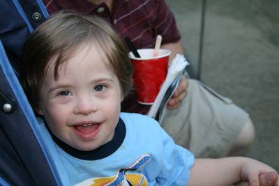 young boy in stroller