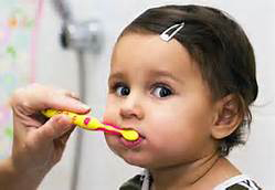 baby brushing teeth